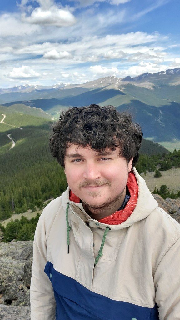 Nick Huber, founder and principal engineer of Niche.dev, photographed in the Rocky Mountains